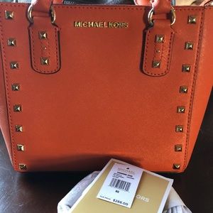 Orange studded statement Mini Mk purse